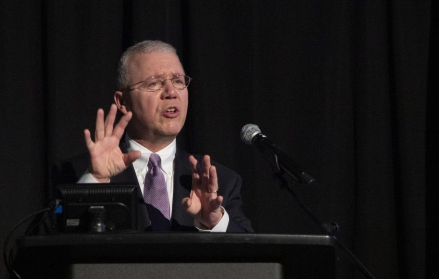 City Manager Mark Rohloff speaks at the State of the City event about plans for the future of Oshkosh and the importance of community development. 