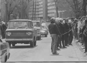 UW Oshkosh Archives photo — Hundreds of police officers kept students at bay to reopen Algoma Boulevard.