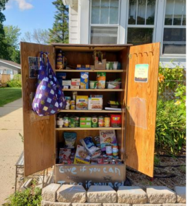 Kaitlyn Scoville / The Advance-Titan — Mary Drephal, with two young children and a working husband, has stepped up to address food insecurity in her neighborhood on West 16th Avenue by putting up a curbside pantry.