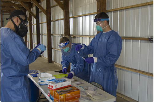 Citizen soldiers and airmen from the Wisconsin National Guard collect specimens for COVID-19 testing June 11 at the Merrill Festival Grounds in Merrill. The National Guard is opening up a testing site in Oshkosh on Sept. 1.  Photo by Sgt. Alice Ripberger