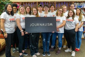 Students from the Fall 2019 Journalism Special Topics in Writing/Editing - Feature Writing class. From left,  front row: instructor Grace Lim, students Gabrielle Fischer, Natalie Dillon, Kaitlyn Scoville, Bethanie Gengler (student editor) and Julia Beck; (back row) Jelissa Burns, Megan Behnke, Joe Schultz, Jack Tierney, Neal Hogden, Leo Costello and Christina Basken.