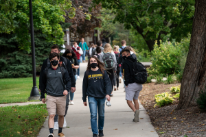UWO Flickr — Students wearing masks to and from classes is now a common sight on the UW Oshkosh campus.