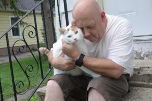 Chris and his cat, Rommel, whom he adopted after Mr. Pooh died. Chris credits Mr. Pooh for saving
his life after the cat came up to him and rubbed against his leg, giving him a moment of clarity just
before he was about to kill himself.