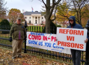 Protesters gathered outside the Governors mansion call for prison reform in Wisconsin. OSCI had 957 cases as of Nov. 25.