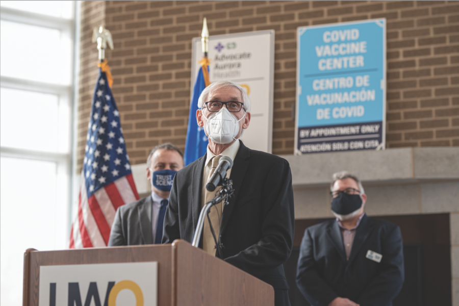 April Lee / Advance-Titan
Gov. Tony Evers celebrates the opening of the Culver Family Welcome Center vaccination site. The community COVID-19 vaccination center opened on the UWO campus Feb. 16 in partnership with Advocate Aurora Health of Oshkosh and the Winnebago County Health Department