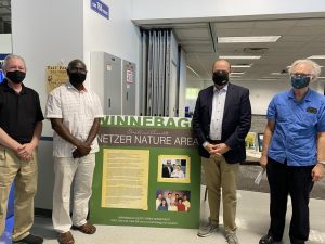 UW Oshkosh faculty and administrators attended the dedication of the Netzer Nature Area in August. From left are Geography Department chair Micheal Jurmu, geography professor Mamadou Coulibaly, Chancellor Andrew Leavitt and retired geography professor John Cross.

