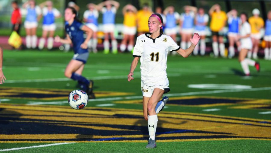 Courtesy of UWO Athletics
Molly Jackson dribbles past a UW-Stout player on the home field.