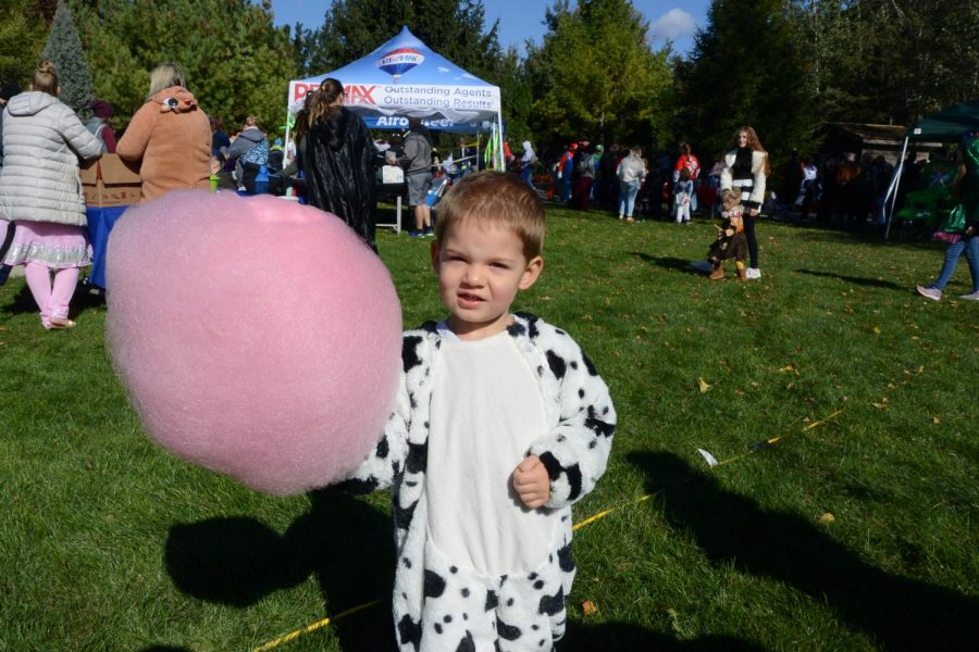 Kyle Jahnke / Advance-Titan 
Pictured above is Cade Larson, age 3, and from Neenah enjoying some cotton candy, all dressed-up.