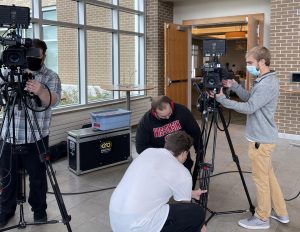 Brady Meyer / The Advance-Titan
From left, Radio-TV-film students Bailey Laird, Max Rinn and Brady Bierman and staffer Tyler Egnarski set up to film the UWO Distinguished and Outstanding Young Alumni Award recipients at the Alumni Awards Friday.