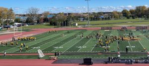 Brady Meyer /The Advance-Titan 

The Oshkosh and Eau Claire teams warm up before Saturday’s big game. 

