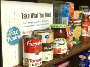 Kelly Hueckman / Advance-Titan
The Fox Cities Student Affair office has a book shelf called Fox Pantry that contains canned food, hygeine products and necessary school supplies for students to buy.