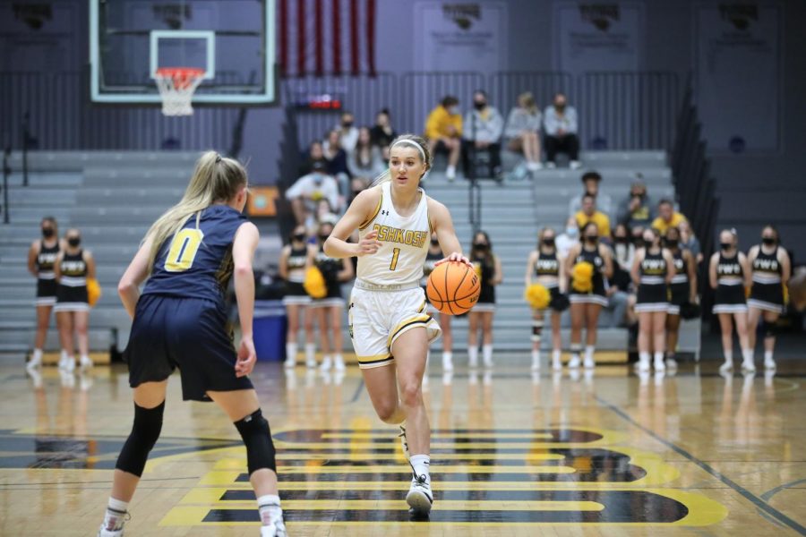 Courtesy of Steve Frommell
Senior Julia Silloway takes the ball up the court while being defended by Kerstin Sauerbrei in UWO’s 79-40 home opener win against Lakeland University. Silloway had three points, five rebounds and four assists.
