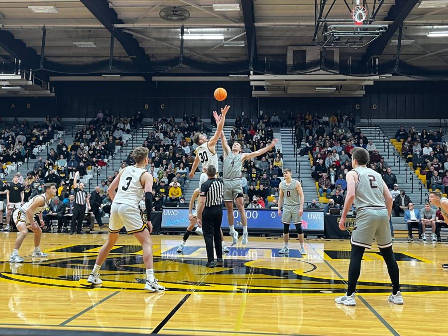 Cory Sparks / Advance-Titan
Forwards Levi Borchert (left) and Ethan Anderson (right) jump for the tip-off of UWO’s 80-77 win in a matchup that featured two top-10 nationally ranked teams.