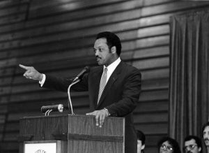 Courtesy of University Archives
Jesse Jackson, civil rights activist, minister and politician, speaking at Kolf Sports Center during his campaign for the democratic nomination for president.
