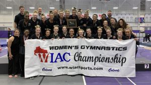 Courtesy of UWO Athletics
The gymnastic team poses after their away victory at Whitewater. UWO has been the defending champions of the WIAC title.