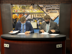 Cory Sparks / Advance-Titan
Brady Meyer and Chandler Brindley prepare for the 4 p.m. news show that airs every Friday. They cover campus and national news, as well as campus sports and Division I sports.