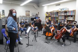 Music students support prof with playing of Ukranian National Anthem