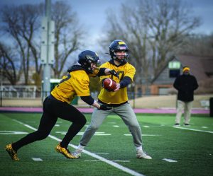 Courtesy of Jaylen Hill
UWO’s Jake Leair hands the ball off to a running back during a spring football practice at J.J. Keller Field.
