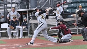 Courtesy of UWO Athletics
Matt Scherrman hits a single in the second game of Monday’s doubleheader agaist UW-La Crosse. UWO sits alone in third place in the WIAC.