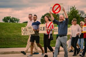 Photo: Charlie Bruecker / The Advance-Titan —
Custodians, grounds and maintenance crews, faculty, staff and others marched around campus on Tuesday to stop UW Oshkosh from outsourcing jobs.