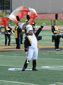 Photo creds: Kayla Curtis / The Advance-Titan-- Drum major Chandler Sumner-Gehrig leads at the
marching bands inaugural performance. 