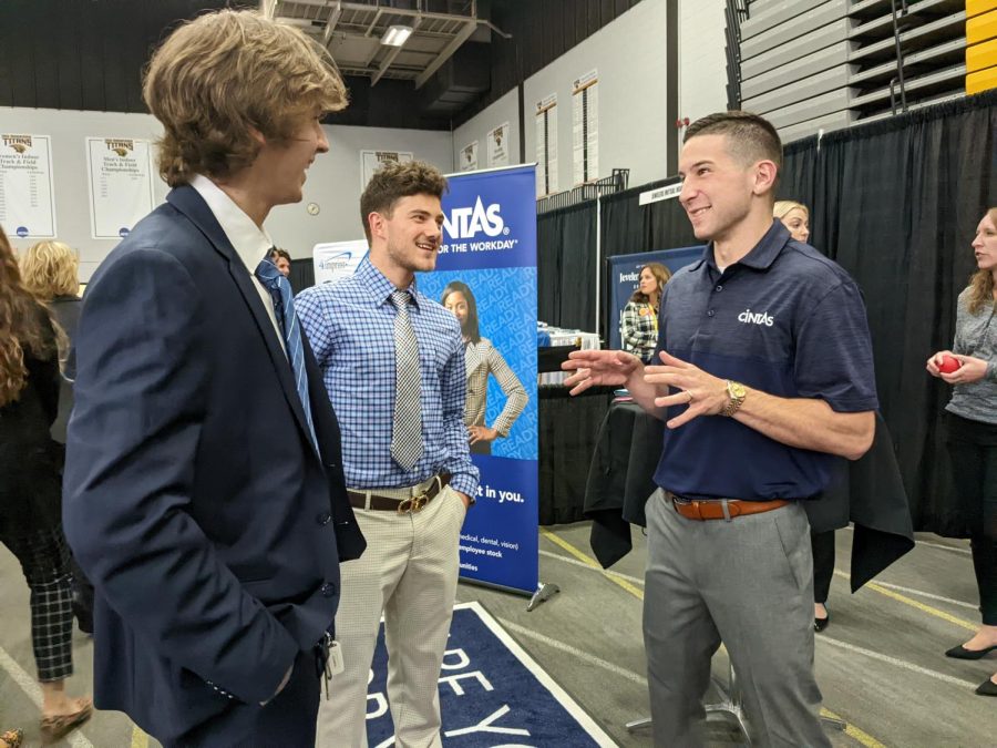 Photo: Molly Miesbauer / The Advance-Titan-- Tony Steppan speaks with Michael Gindhart (back) and Carter Hendrickson (front) at the UWO Career Fair on the Fox, opening doors for future career opportunities.
