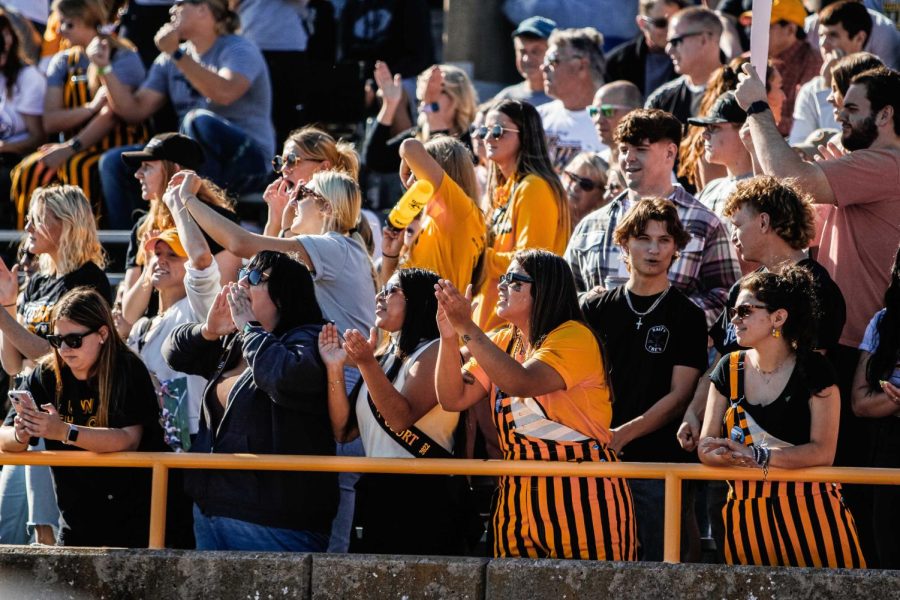 Photo: Morgan Feltz/Advance-Titan — The students cheer on the UW Oshkosh Titan football team during Homecoming 2022.