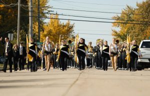 Photo: Morgan Feltz/Advance-Titan — It isnt Homecoming without a parade. Here, the Titan Thunder perform as they march toward oJ.J. Keller Field.