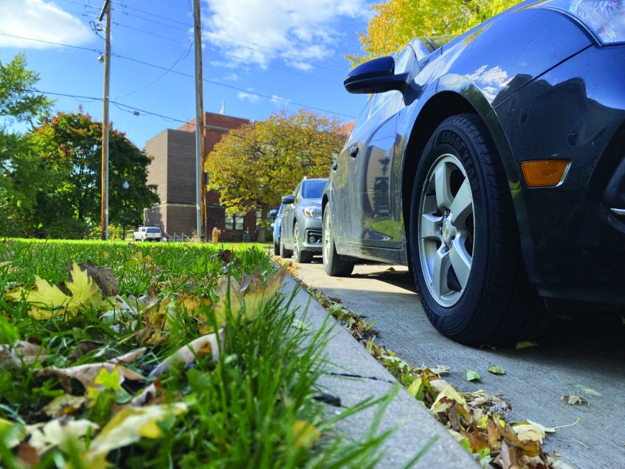 Kelly Hueckman / The Advance-Titan--Parking close to the curb, not wasting space and not blocking driveways can minimize parking and driving troubles.