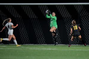 Photo courtesy of Terri Cole-- UWO goalkeeper Mallory Kerhin (99) denies a shot on goal. During the game, Kerhin prevented 10 shots on goal leading to a save percentage of 0.769 and boosting her total saves to 61.