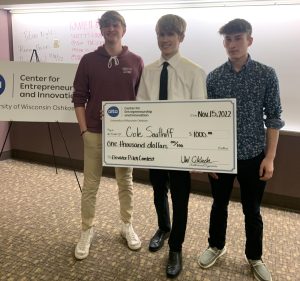 Josh Lehner / Advance-Titan — From left, Matthew Hansen took third place, Cole Saathoff received first place and Ari Malloy took second place in UWO’s Elevator Pitch contest Tuesday night.