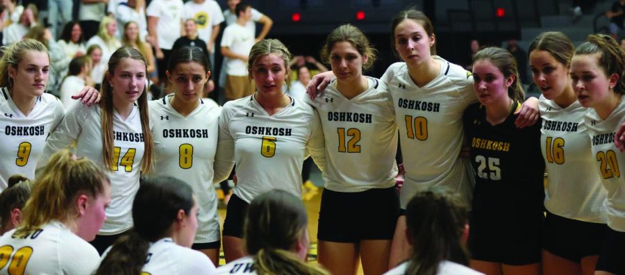 Courtesy UWO Athletics-- The UWO volleyball team gathers at the bench during a break in the match to rally spirits.
