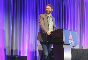 Katie Pulvermacher/The Advance-Titan — Keynote speaker Dave Jorgenson shares his journey of how he became The Washington Post TikTok Guy on Oct. 30 at MediaFest 22.