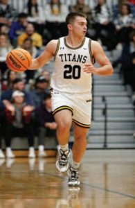 Morgan Feltz / the Advance-Titan -- Quinn Steckbauer dribbles the basketball Feb.11.