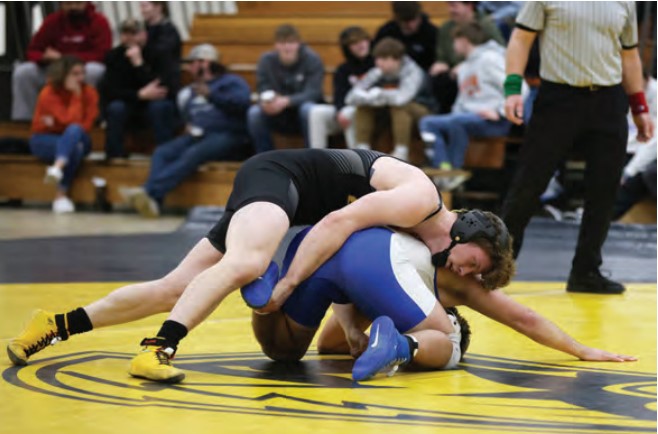 Courtesy of UWO Athletics / Beau Yineman pins his opponent in the Pat Flanagan Open Jan. 28.