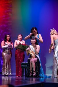 Courtesy of Thom Hadel, Back Row Photography - UWO student Taylor Swanson is crowned Miss Oshkosh 2023 by Miss Oshkosh 2022 and UWO alumna Kianna Fiedler