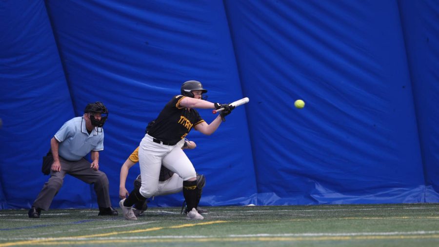 Courtesy of UWO Athletics -- UWOs Hannah Ritter bunts the ball against Milwaukee School of Engineering March 11.