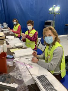 Photo courtesy WCHD — Winnebago County Health Department nurses prepare COVID-19 vaccine at Sunnyview Expo Center. 