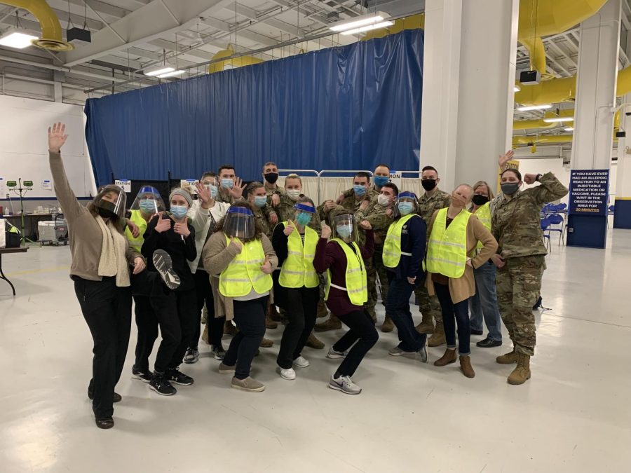 Photo courtesy WCHD — The Wisconsin National Guard, Winnebago County Health Department staff and volunteers celebrate together after providing a record 1,256 vaccine doses on day three of the Sunnyview Expo vaccine clinic.