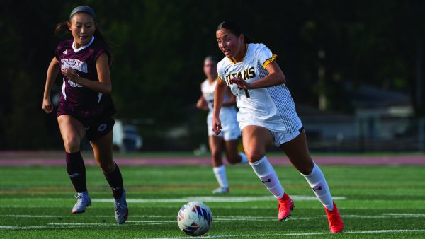 Courtesy of UWO Athletics / UWO forward Gabriella Mattio dribbles down the field while being pursued by a University of Chicago player Sept. 20 at Titan Stadium.