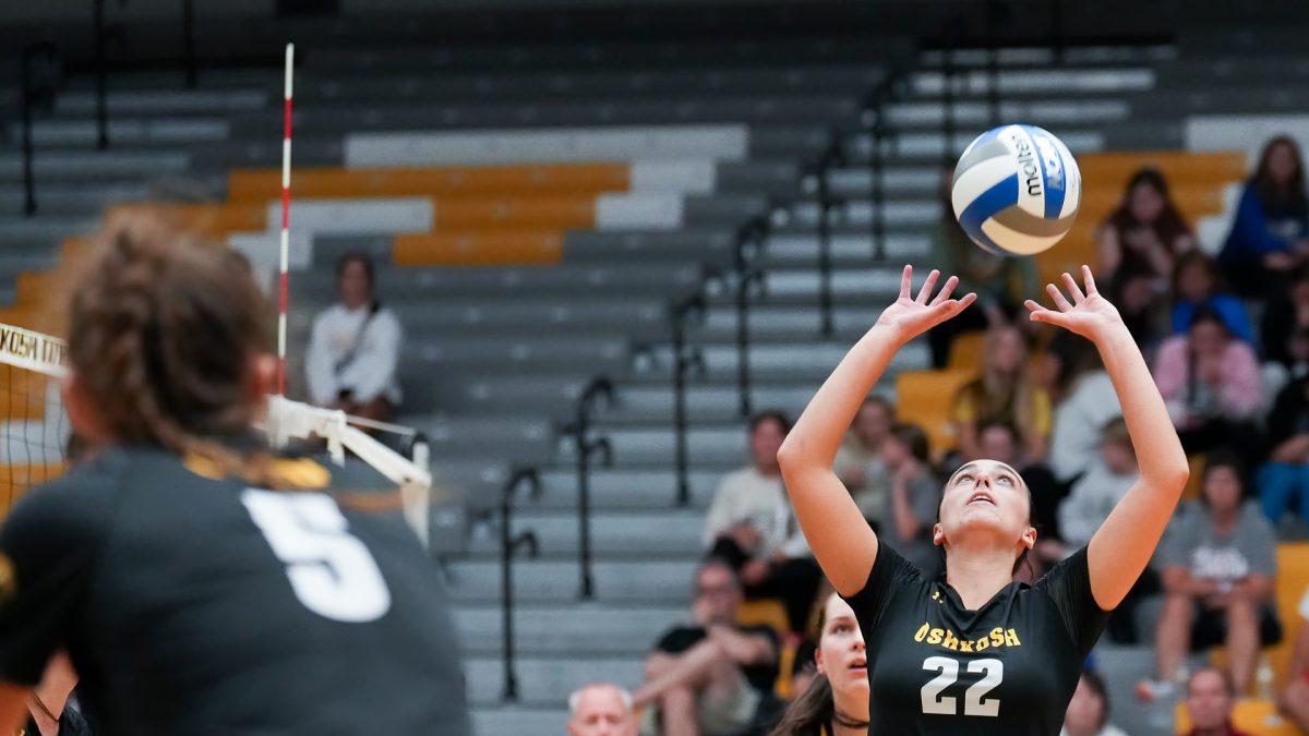 Courtesy of UWO Athletics -- Oshkoshs Izzy Coon sets a ball in a match earlier this season at the Kolf Sports Center. Coon set a career-high with 32 assists against Northwestern.