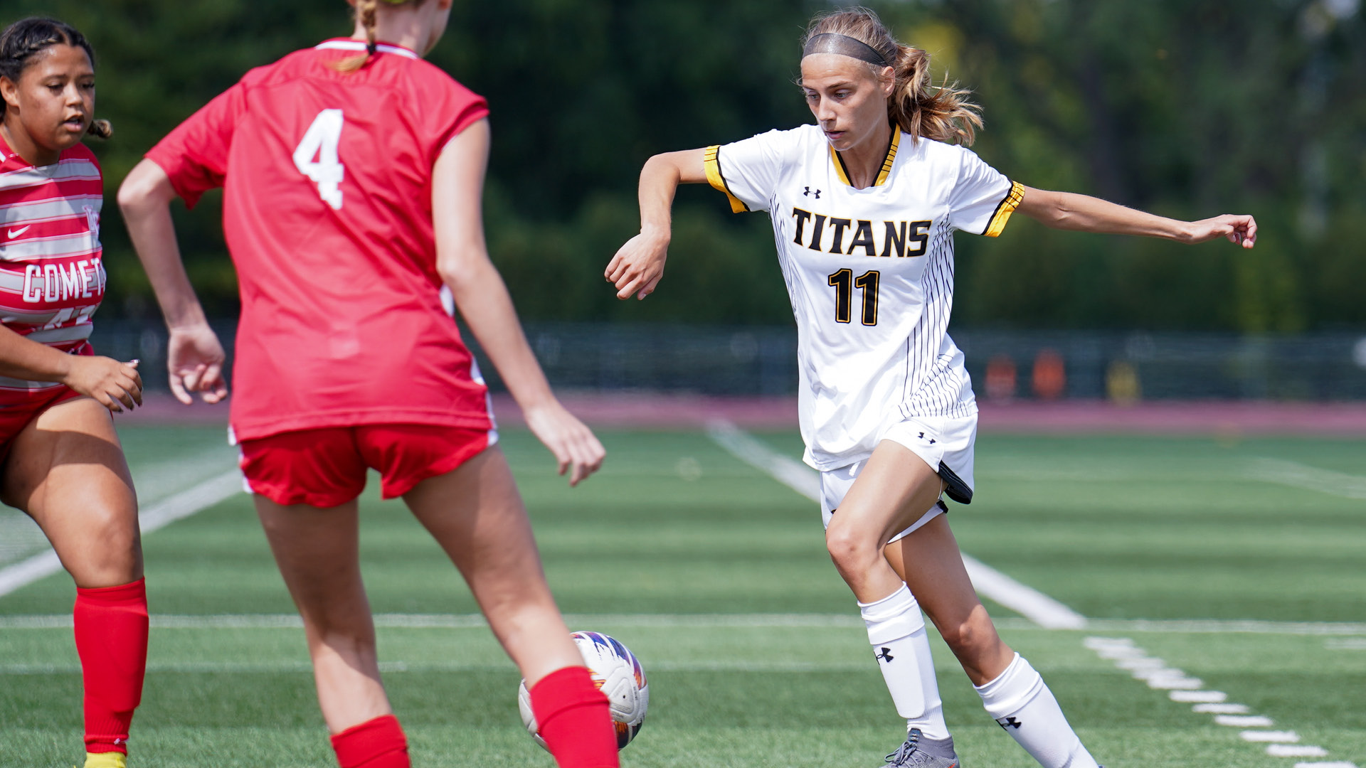 Courtesy of UWO Athletics -- UWOs Molly Jackson dribbles the ball in a game earlier this season. Jackson scored the Titans lone goal in the 73rd minute against Carthage.