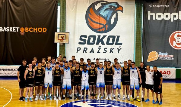 Courtesy of UWO Athletics -- The UWO mens basketball team poses with Czech basketball team Sokol Prazsky after an exhibition game between the two teams over the summer in Prague.