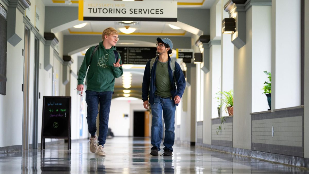 Two students walk the hallways of UW Oshkosh at Fox Cities, one of UWOs two branch campuses.