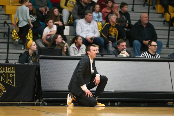 Morgan Feltz / Advance-Titan -- UWO head basketball coach Matt Lewis watches the team on the floor during a game last season.