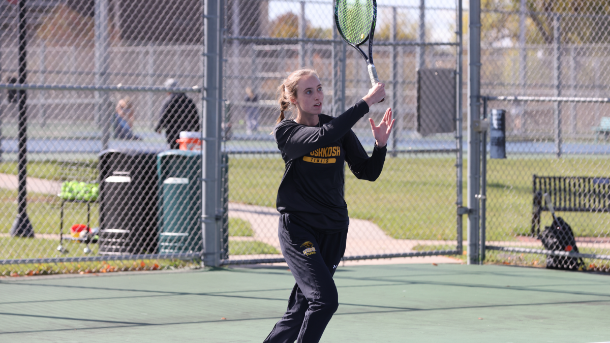 Morgan Feltz / Advance-Titan -- Olivia Pethan volleys the ball in a home match earlier this season. Pethan picked up wins in both the No. 1 doubles and singles in UWOs sweep over UW-Stout Oct. 15.