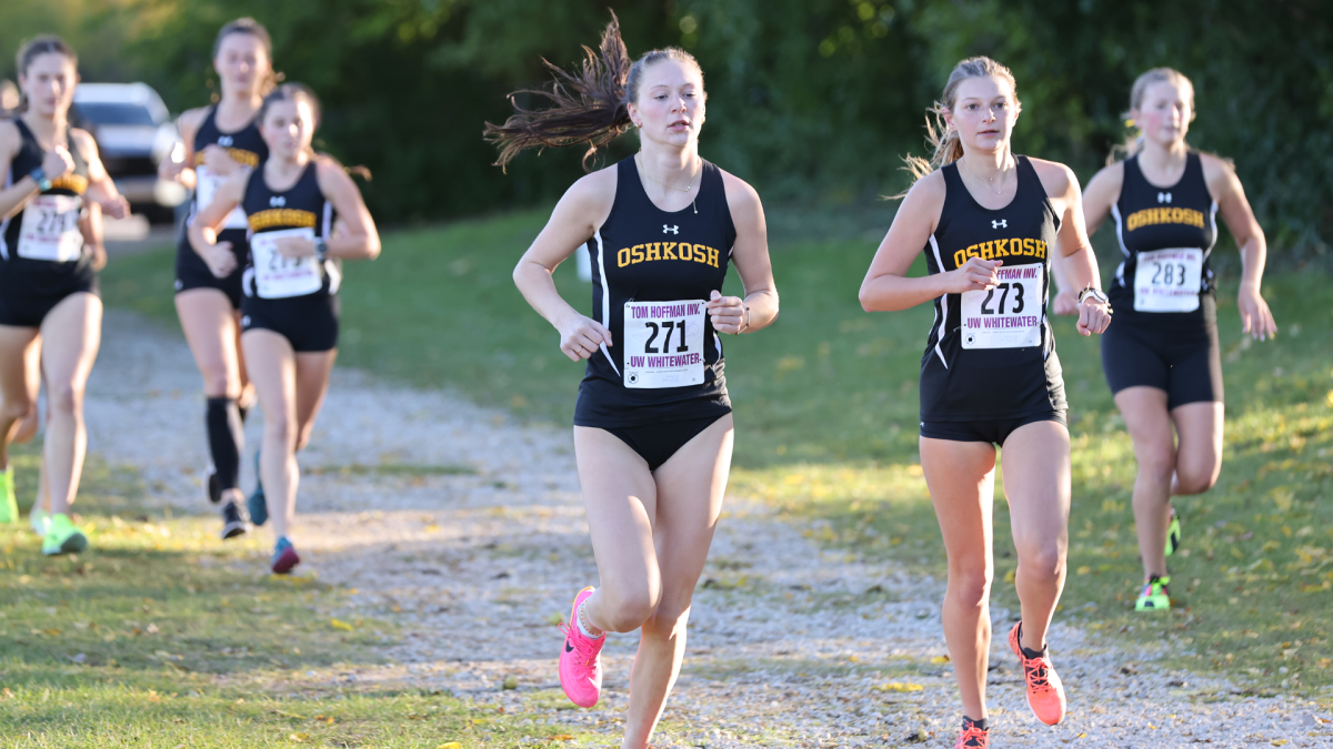 Courtesy of UWO Athletics -- Meygan Benzing (center front), paced seven top-10 UWO finishers at the Warhawk Open with a third place, 25:19 performance.