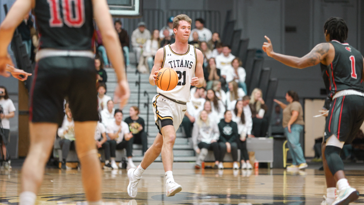 Courtesy of UWO Athletics -- Carter Thomas dribbles the ball in UWOs home opener Nov. 8 at the Kolf Sports Center. Thomas went four-of-five from behind the arc in the Titans loss to Redlands on Saturday.