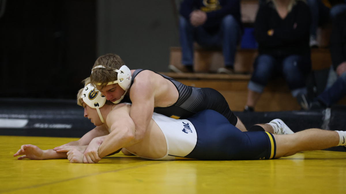 Courtesy of UWO Athletics -- Andrew Schad pinned Jaydon Sheppard in the Titans 49-6 loss to UW-Eau Claire on Wednesday at the Kolf Sports Center.