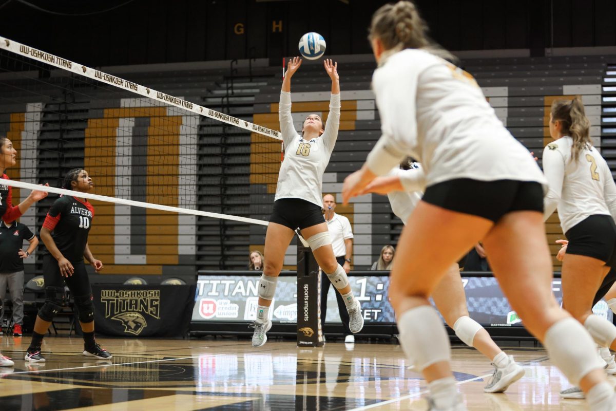 Morgan Feltz / Advance-Titan -- UWO’s Jaclyn Dutkiewicz sets up her teammates for a spike against Alverno College on Oct. 31 at the Kolf Sports Center.
